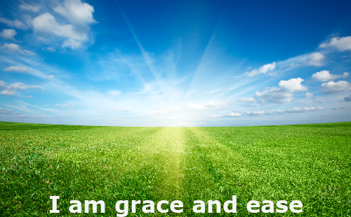 Prosperity Affirmation against the background of the sun shining on the grass.  The affirmation is "I am grace and ease"