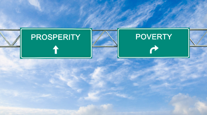 A prosperity consciousness direction sign pointing to a prosperity or poverty mentality.
