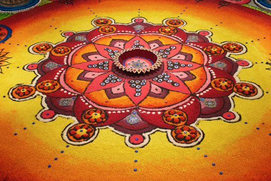 Rangoli includes symbolizing creating prosperity.