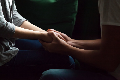 Letting go of the suffering is a great start in how to forgive someone.  Letting go of the suffering is symbolized with the photo of a couple holding hands.