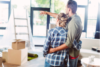 The couple in a new home are capturing the essence of the visualization tip - "Begin with the end in mind."